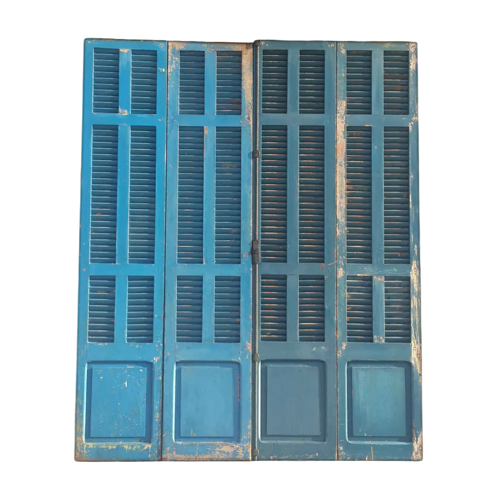 Four-leaf set of weathered blue reclaimed antique abajour louvered shutter doors on a black background